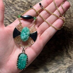 Vintage gold toned metal Chinese style necklace with carved Peking glass